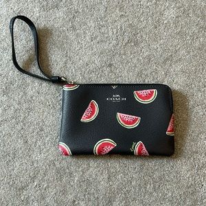 Coach- watermelon printed wristlet